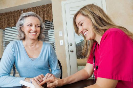 Two women laugh together