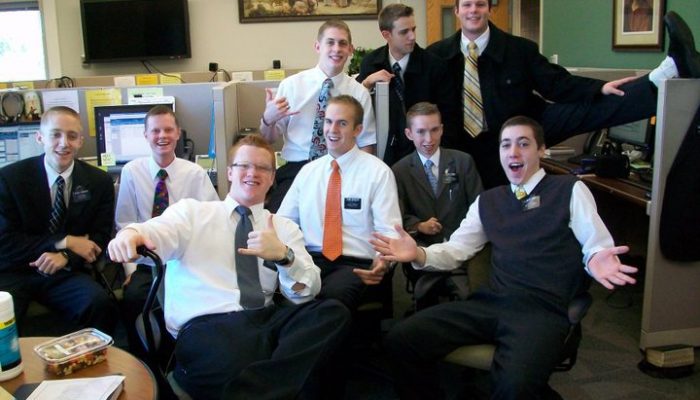 A group of missionaries poses in the referral center at the Provo MTC
