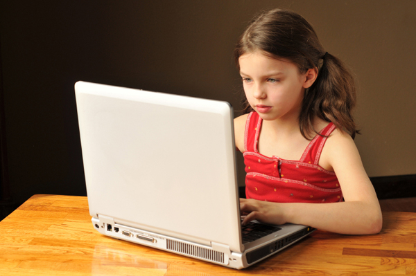 girl using computer