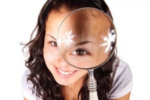 Woman through a magnifying glass