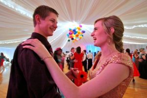 A couple dances at the "Mormon Prom"