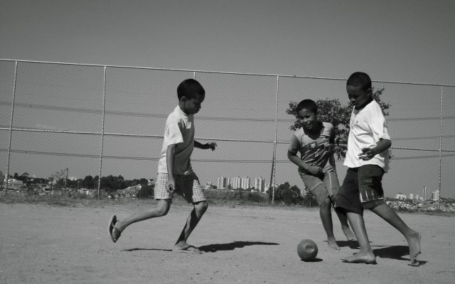 Kids playing soccer in Brazil