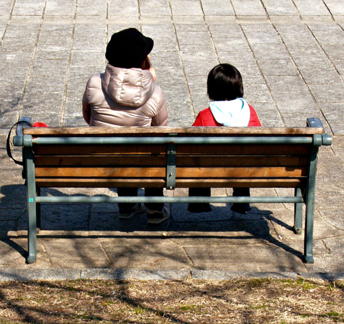 Mom and daughter on a bench