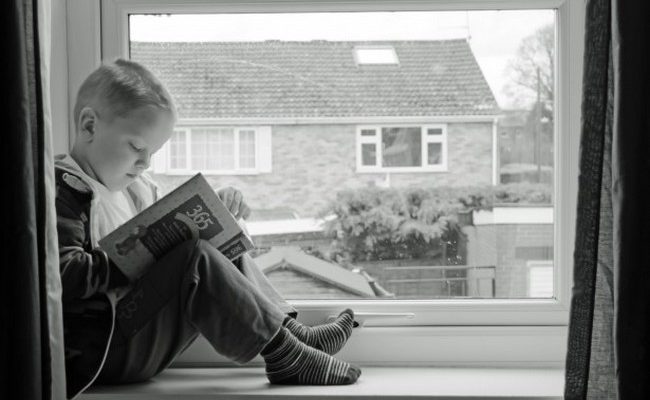 child reading a book