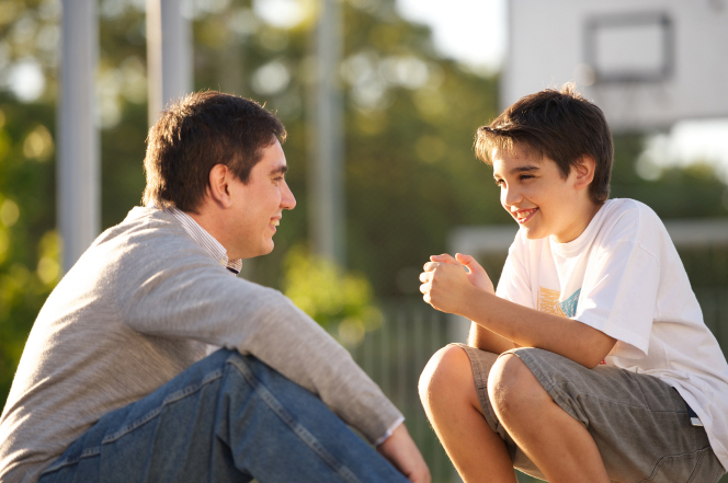 father and son talking