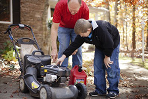 father son lawn mower