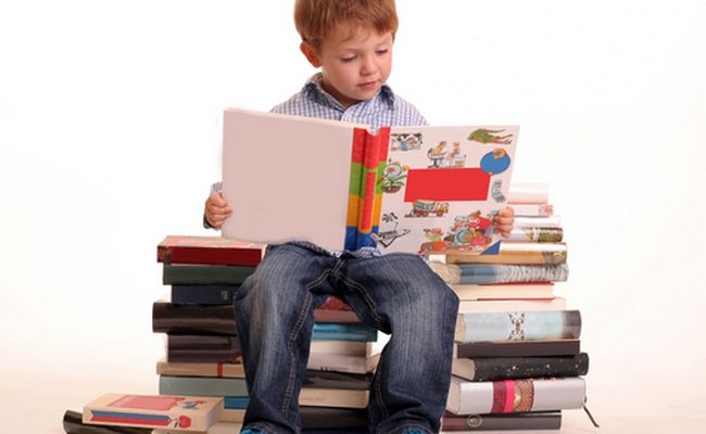 boy reading books