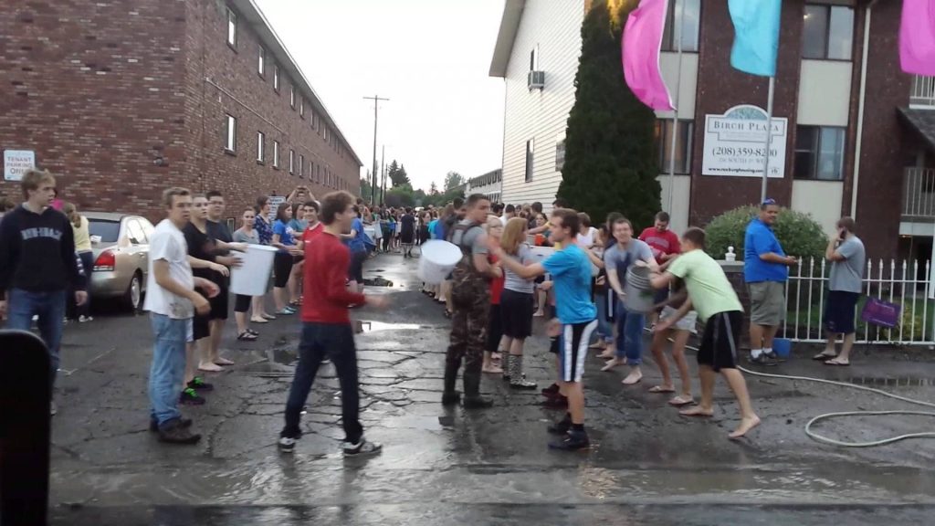 Students helping in cleanup after flash flood in Rexburg