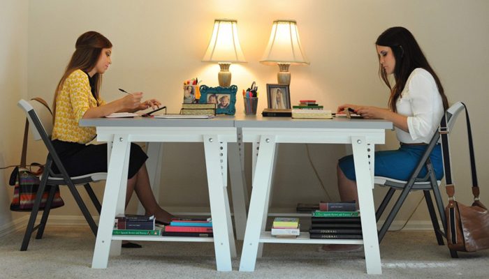 Sister Birch and Larsen start their day by studying the scriptures.