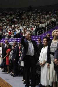 President Dieter F. Uchtdorf, second counselor in the First Presidency, waves to a capacity crowd gathered in the Dee Events Center for the Ogden Utah Pioneer Days Devotional on July 13.