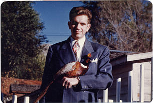 Boyd K Packer holding a pheasant