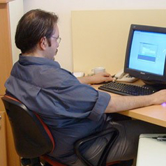 man on computer