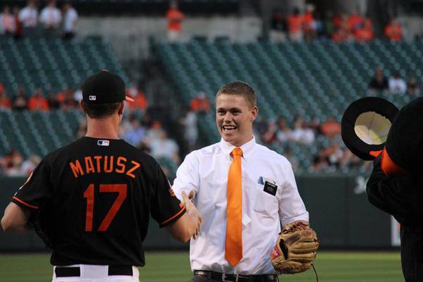 Latter-day Saint apostle throws first pitch at Baltimore Orioles