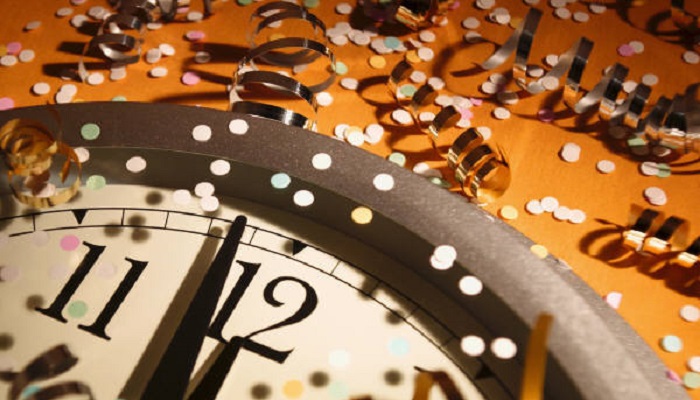 New Years Eve with clock and confetti