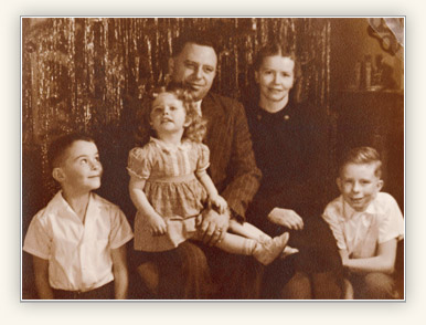 portrait of Quentin L. Cook with parents and siblings