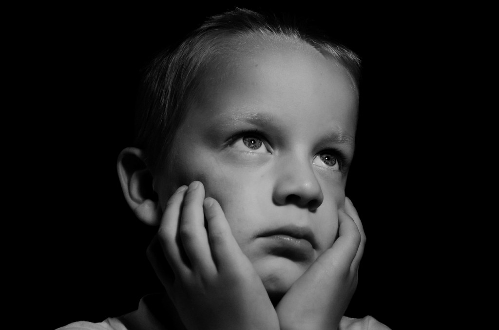 Portrait of young boy that is sad and confused