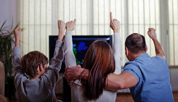 A Family Watching the Super Bowl