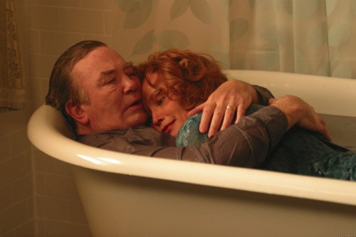 married couple mourning together in Big Fish