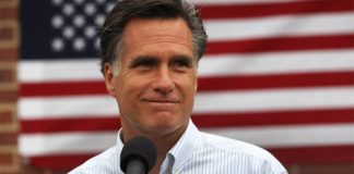 Mitt Romney in front of American Flag