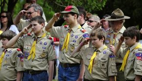 Boy scouts saluting