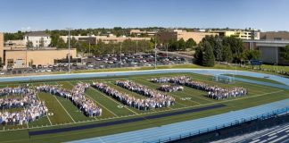 Photo of hundreds of BYU-Idaho students forming BYU-I for a tenth anniversary picture