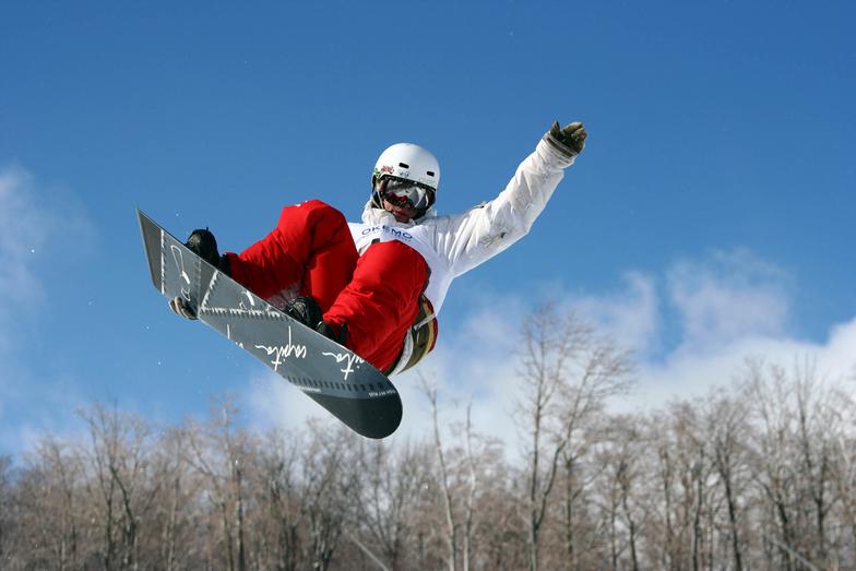 BYU Idaho student snowboarding at Kelly Canyon