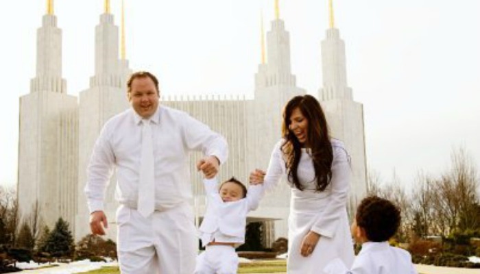 family at the temple in white