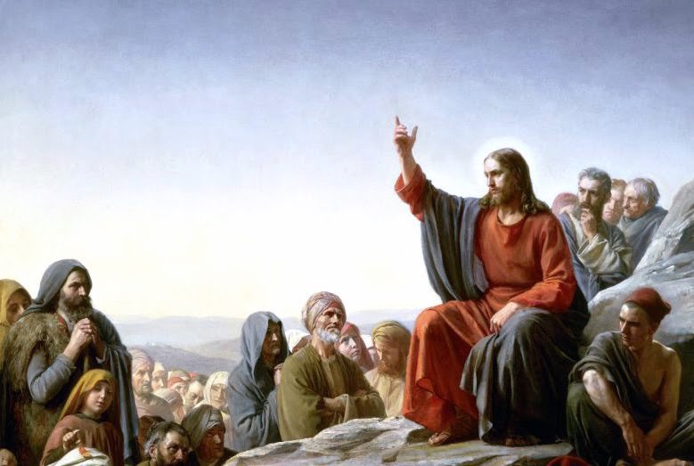 Jesus teaching a sermon to a group of people