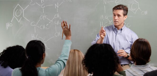 teacher teaching students in a class