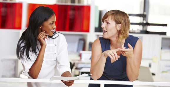 A woman telling her friend how she got called to speak - Image via Huffingtonpost.com