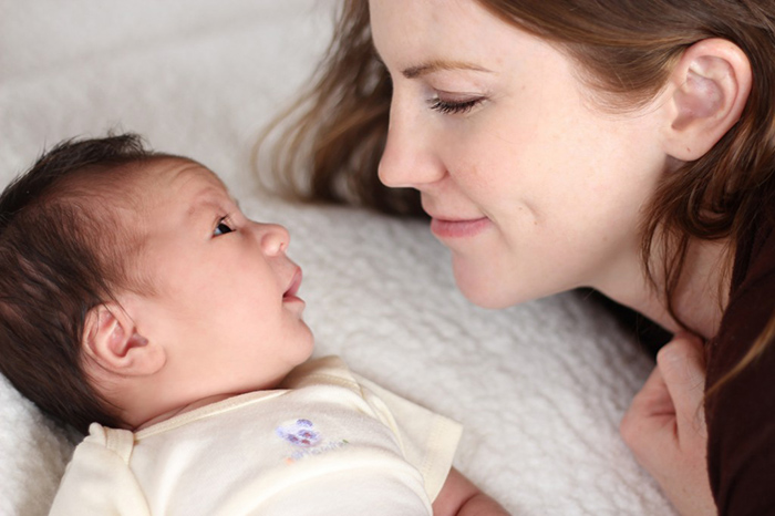 Mother and baby adoring each other. 