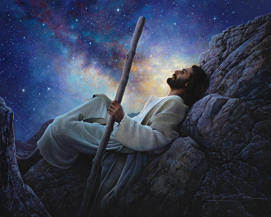 Jesus sits gazing into a sky filled with the Milky Way