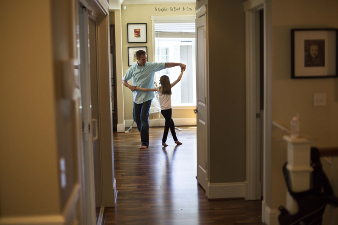 Father dances with daughter