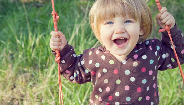 Happy Girl on Swing