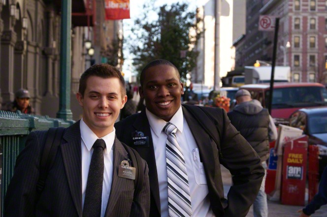 two LDS missionaries smile