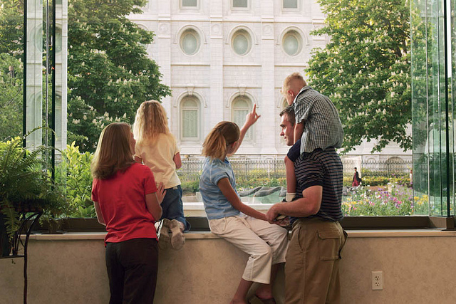 family looking at temple