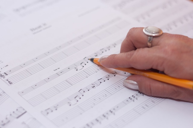 Composer writing a musical melody 