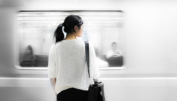 girl watching train pass