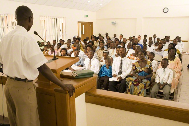 A returned missionary speaking to a ward congregation