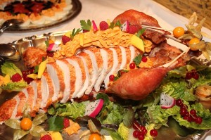 a healthy plate of carved turkey and salad