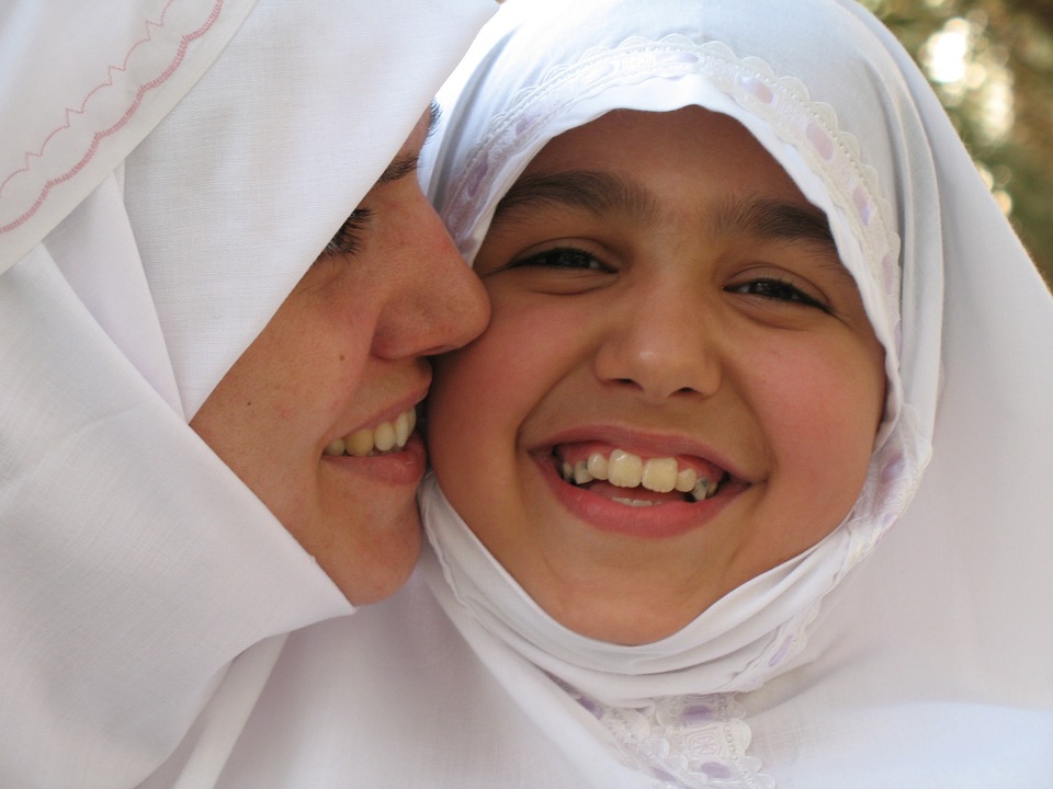 Muslim girls smiling