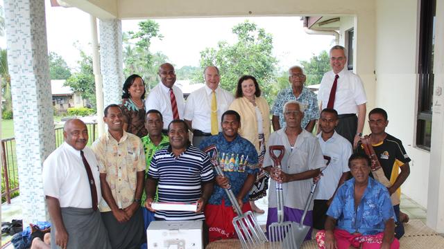 Elder Rasband and Sister Rasband visit a Fijian village. Image courtesy of Newsroom: Pacific.