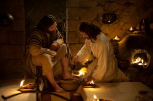 Jesus washing Peter's feet. 