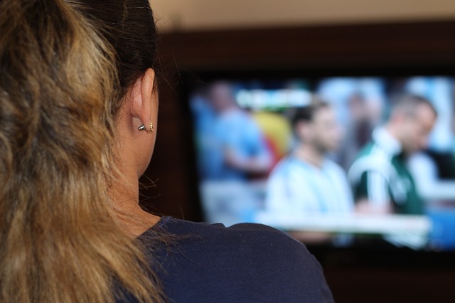 mother takes a break to watch tv