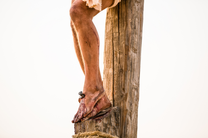  condescension of god through his death on the cross