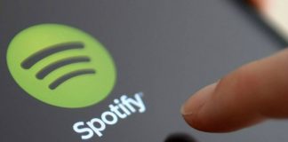 Spotify on handheld tablet