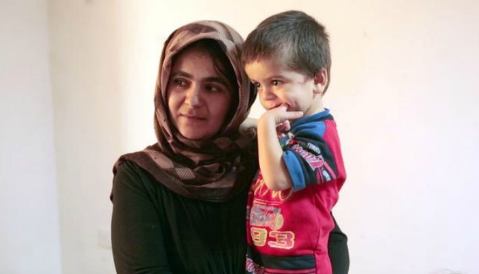 refugee mom and son