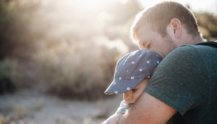 Father hugging his son