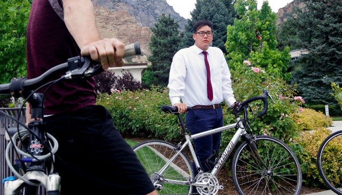 Dalin Earls speaks to friends outside Provo Temple (image via the Daily Herald)