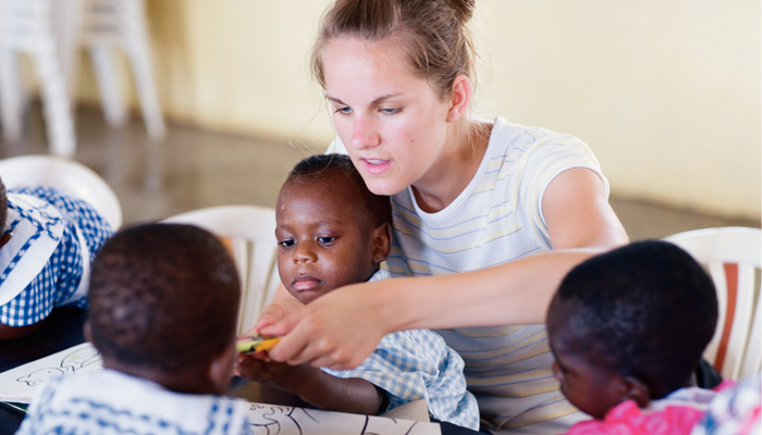 White teacher with black student